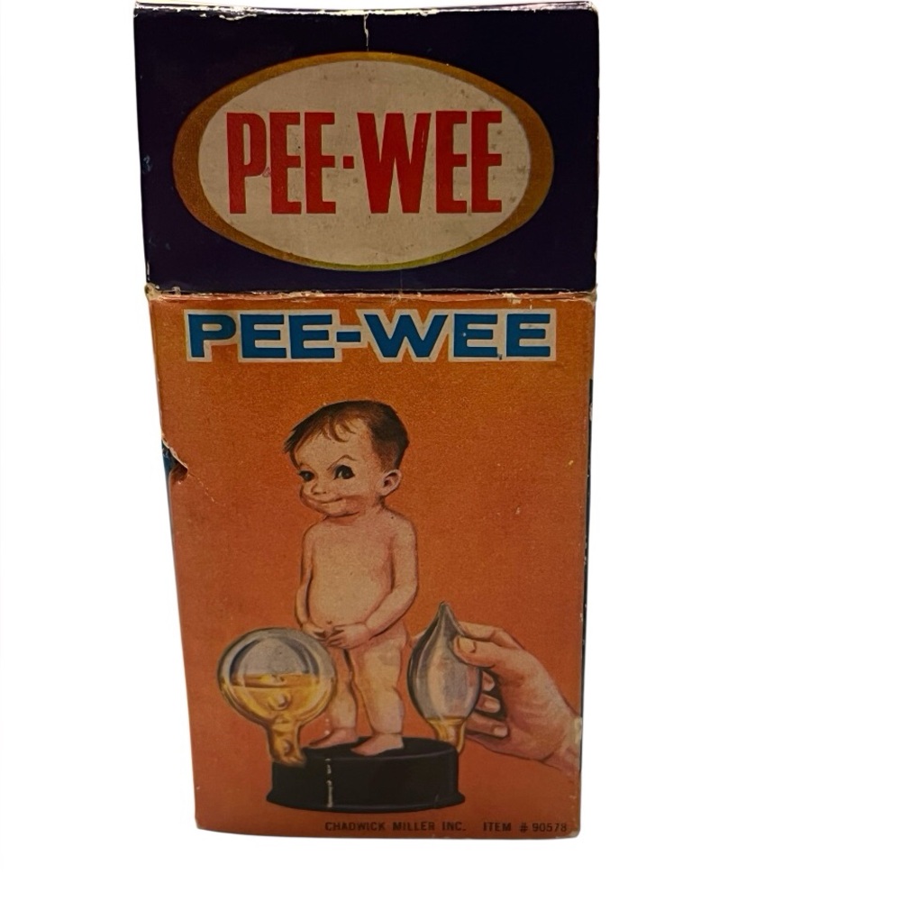 Vintage Pee Wee Doll in original box.